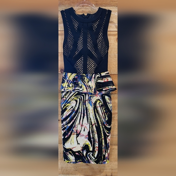 bebe Dresses & Skirts - bebe Black Mesh & Multicolor Abstract Peplum Dress